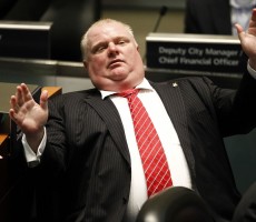 Image: Toronto Mayor Rob Ford reacts during a special council meeting at City Hall in Toronto